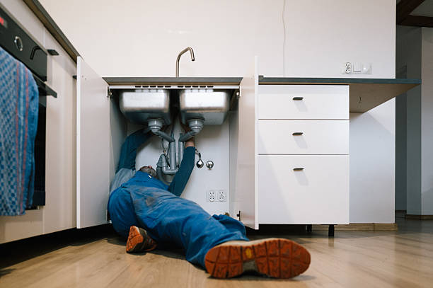 Professional Plumbing technician working in Stone Mountain, GA